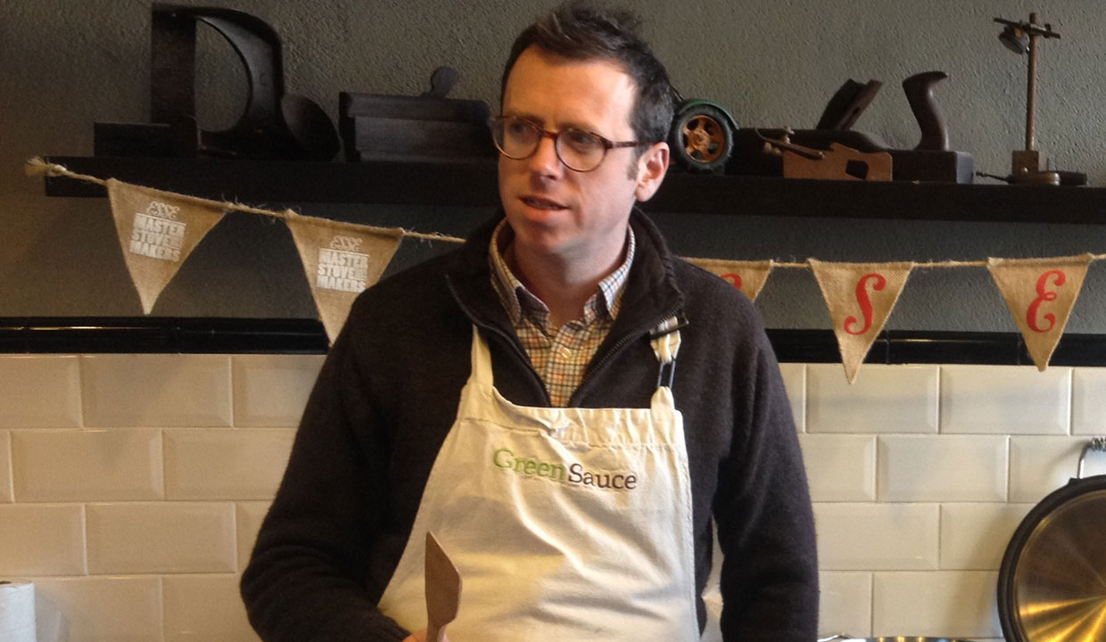 Tim maddams in an apron with an ESSE