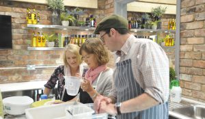 Tim maddams cooking demonstration with two ladies
